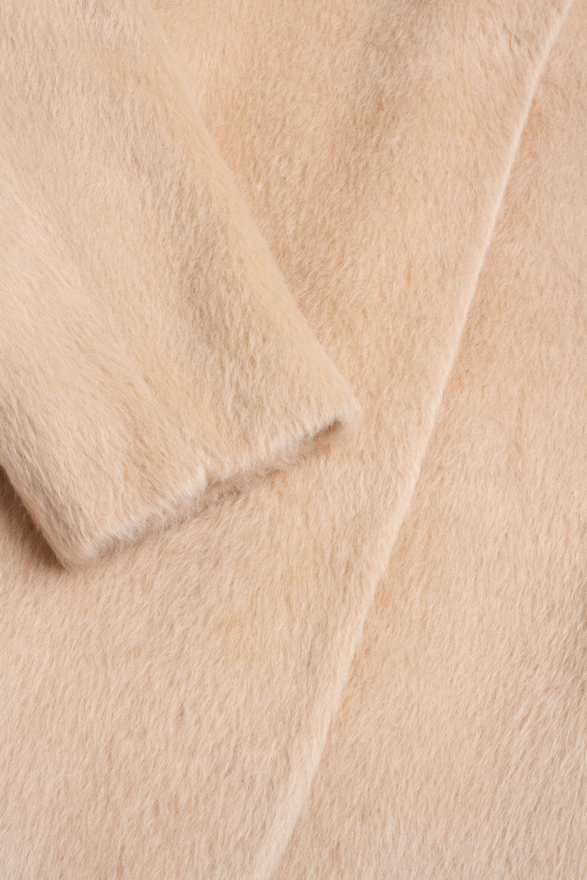 Close-up of a beige fabric texture